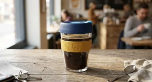 A lightweight KeepCup Original plastic reusable coffee cup with a press-fit lid.